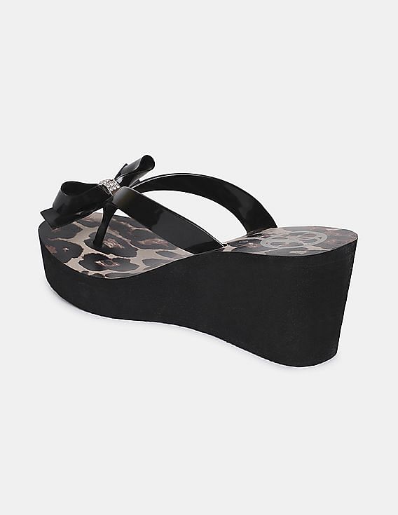 Guess black flip sale flops with bow