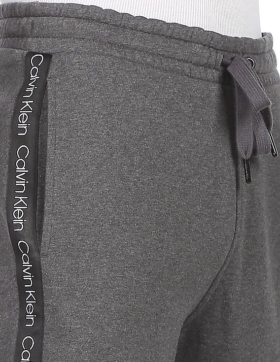 Buy Calvin Klein Men Grey Mid Rise Brand Tape Joggers NNNOW