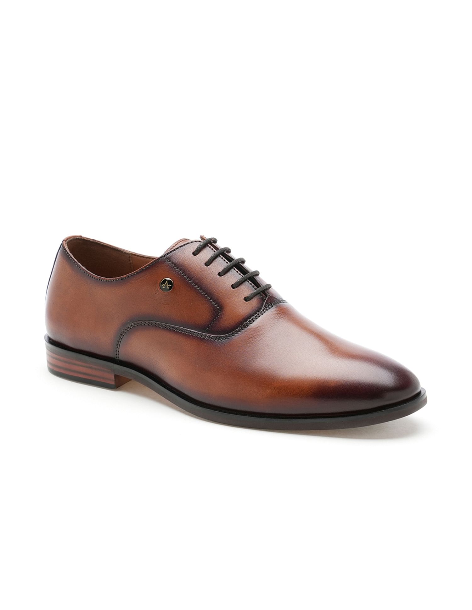 Buy Arrow Leather Solid Orion Shoes NNNOW