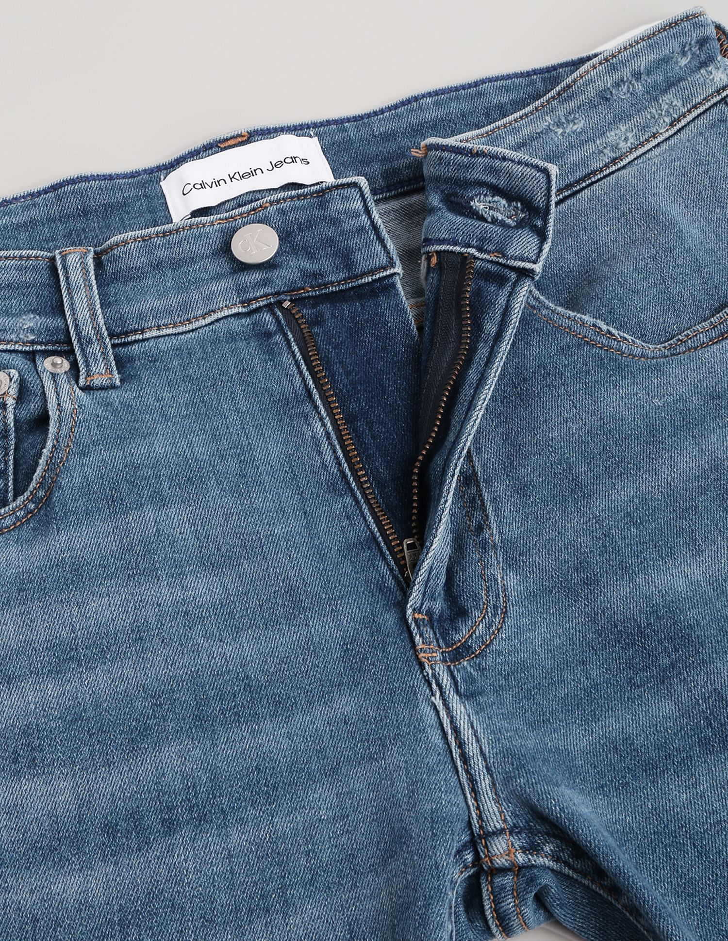 Calvin Klein Modern Tapered Fit Distressed Jeans