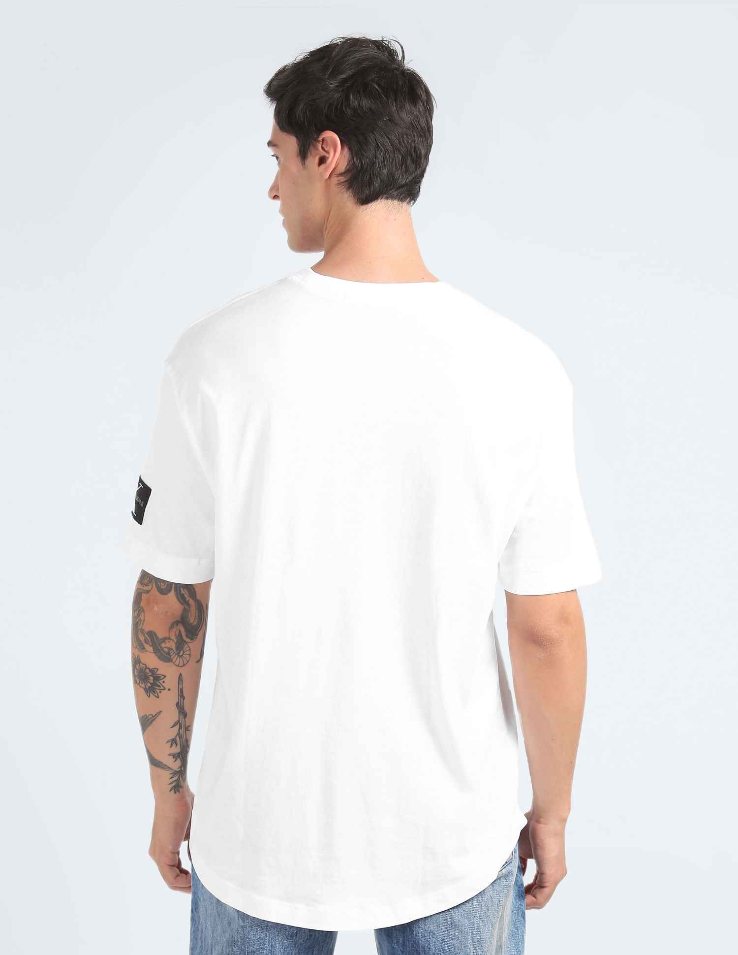 Calvin Klein Jeans monogram chest logo oversized t-shirt in white