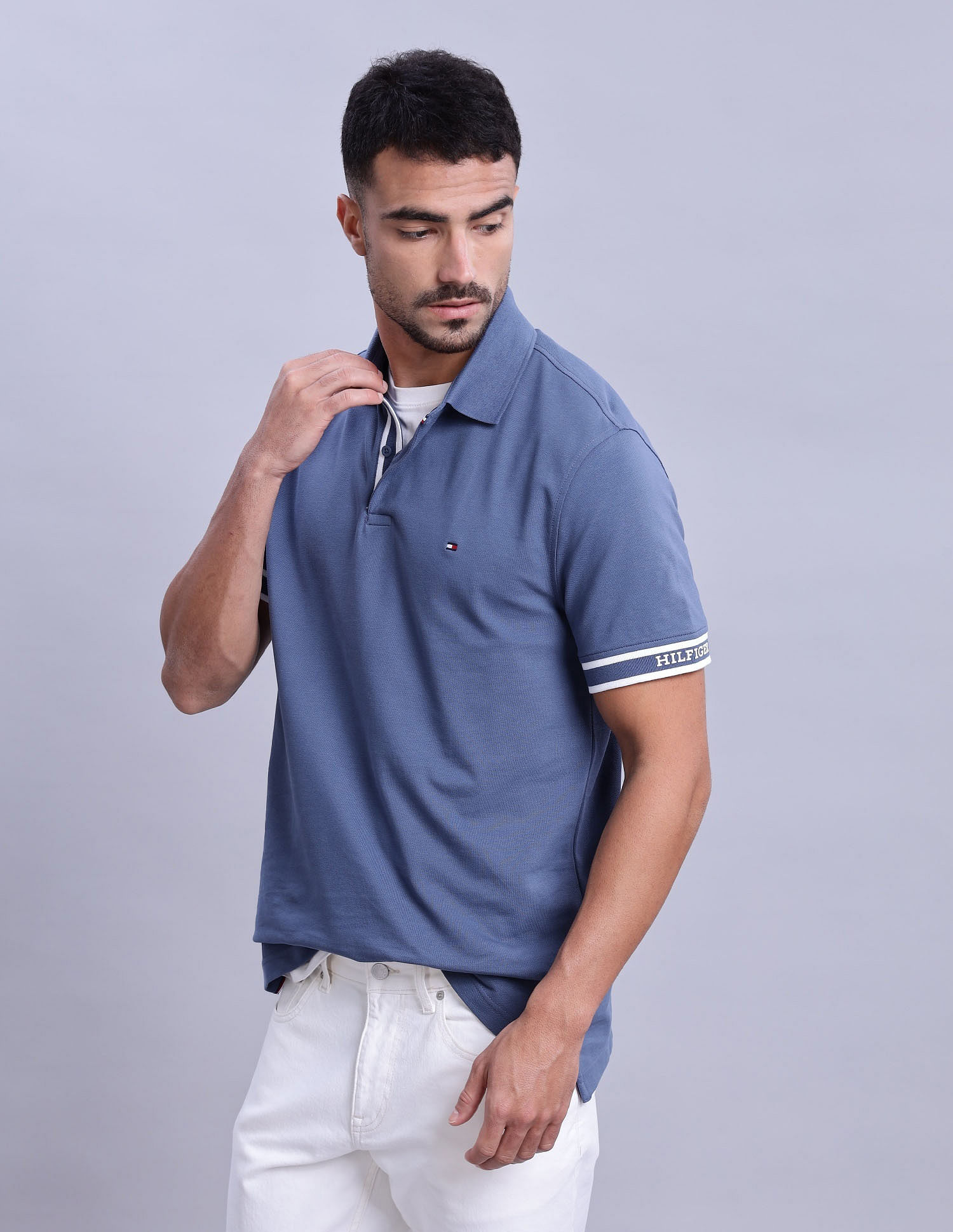Tommy Hilfiger Mens Blue Solid Polo Shirt