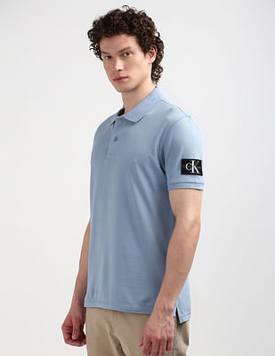 [ JEANS] Crop Badge Polo Shirt ★人気★ Buy Calvin Klein Sustainable Logo Badge Polo Shirt - NNNOW.com