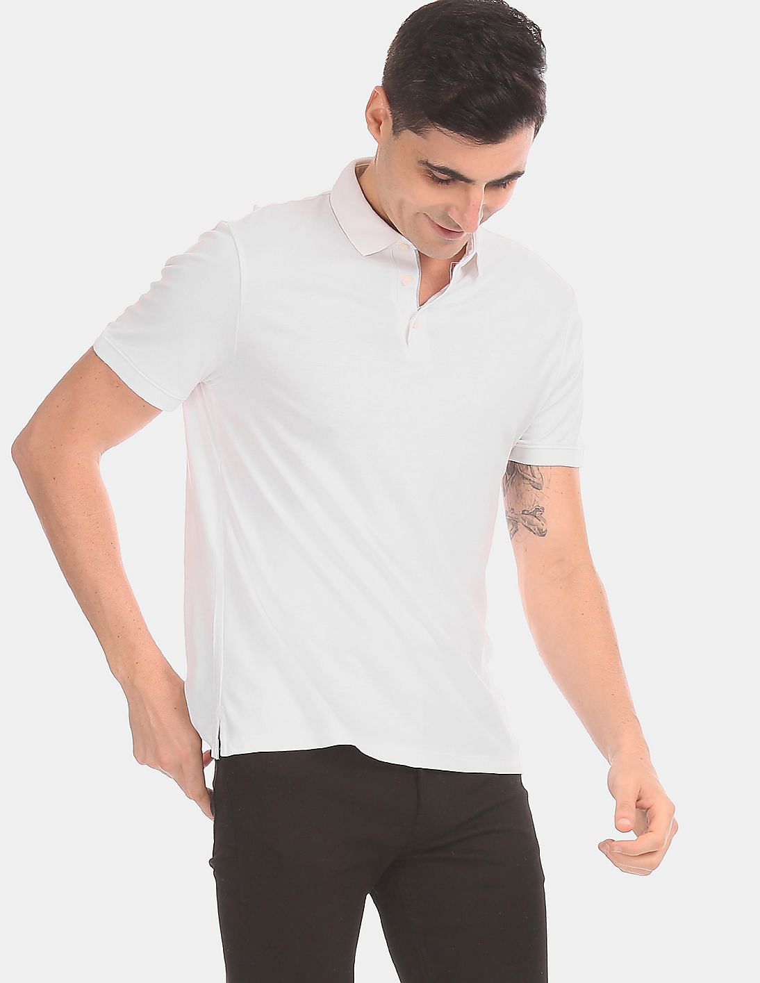 Buy Calvin Klein Men White Regular Fit Solid Polo Shirt - NNNOW.com