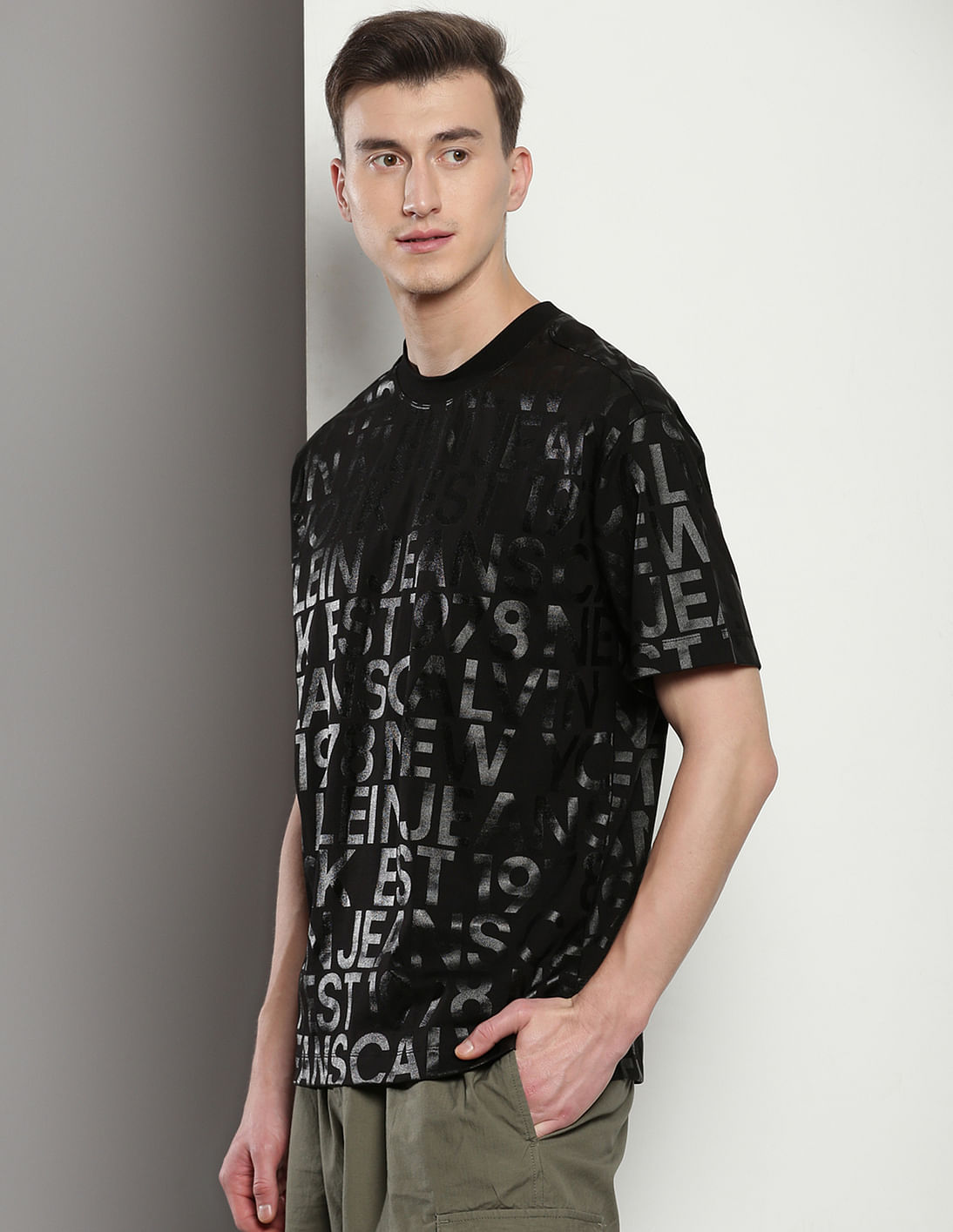 Buy Calvin Klein All Over Logo Relaxed T-Shirt - NNNOW.com