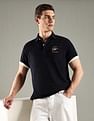 Tommy Hilfiger Solid Regular Fit Cotton Polo T-Shirt