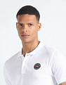 Flying Machine Solid Appliqued Logo Polo Shirt