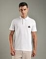 Tommy Hilfiger Solid Regular-Fit Cotton Polo Shirt