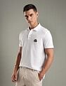 Tommy Hilfiger Solid Regular-Fit Cotton Polo Shirt
