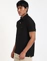 Tommy Hilfiger Solid Regular-Fit Cotton Polo Shirt