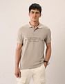 U.S. Polo Assn. Denim Co. Brand Embossed Muscle Fit Polo Shirt