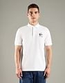 Tommy Hilfiger Solid Regular Fit Cotton Polo T-Shirt