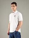 Tommy Hilfiger Solid Regular Fit Cotton Polo T-Shirt